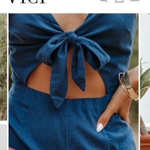 Brand new romper. Tags still attached